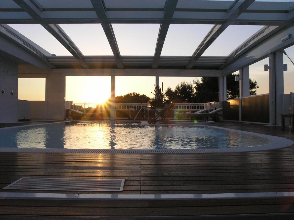 Aparthotel England ริชโชเน ภายนอก รูปภาพ